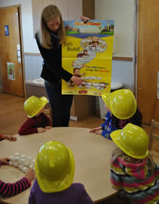 Photo of IWR Employee Kelly Barnes participated in an Engineering Week activity (the ASCE Curious George Bridge Build) at her daughter's preschool.(photos by Becca Gibson).