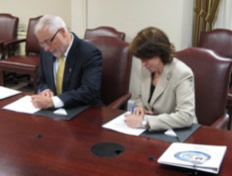 Photo of Partnership Agreement Signing.