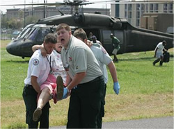 Photo of Elderly resident being evacuated in the aftermath of Hurricane Katrina.