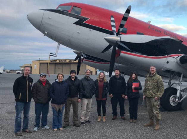 A photo of the JALBTCX team standing in front of their aircraft at Long Island MacArthur Airport in Ronkonkoma, New York.