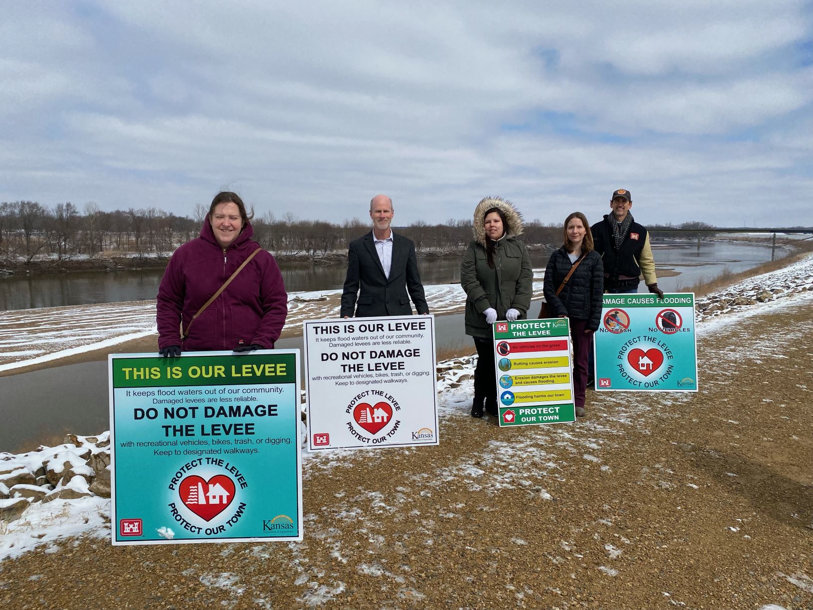 Four signs used for ROCK project regarding levees.